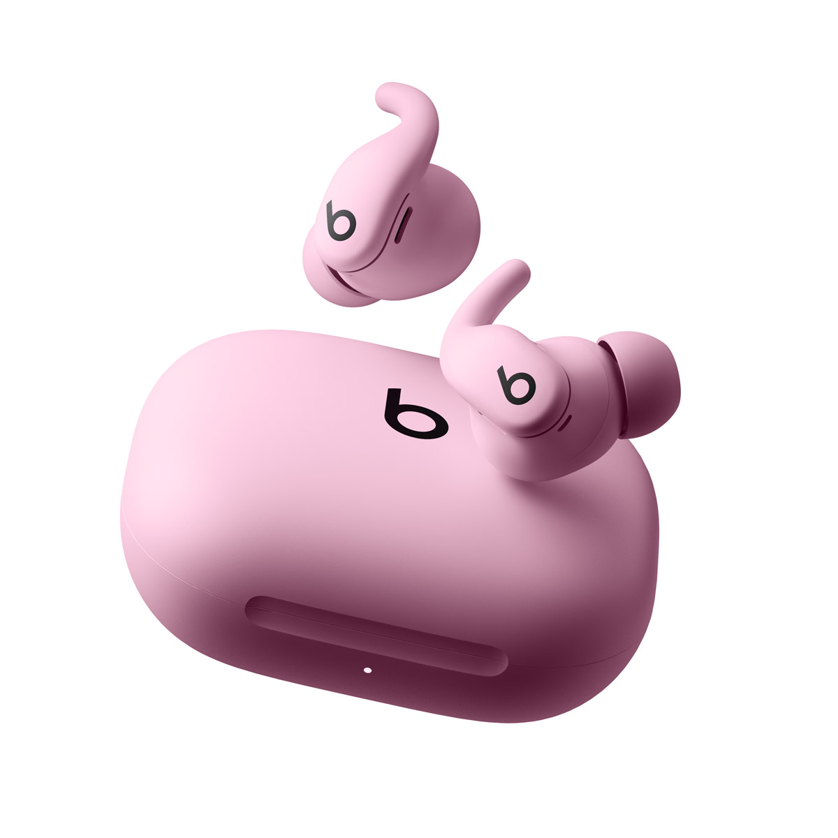 Powerbeats Fit earbuds in Power Pink with matching charging case.