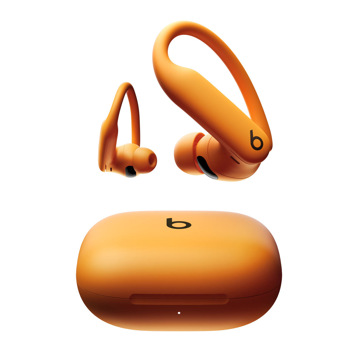 Close-up of Powerbeats Pro in Electric Orange with Wired 2025 Recommends badge.